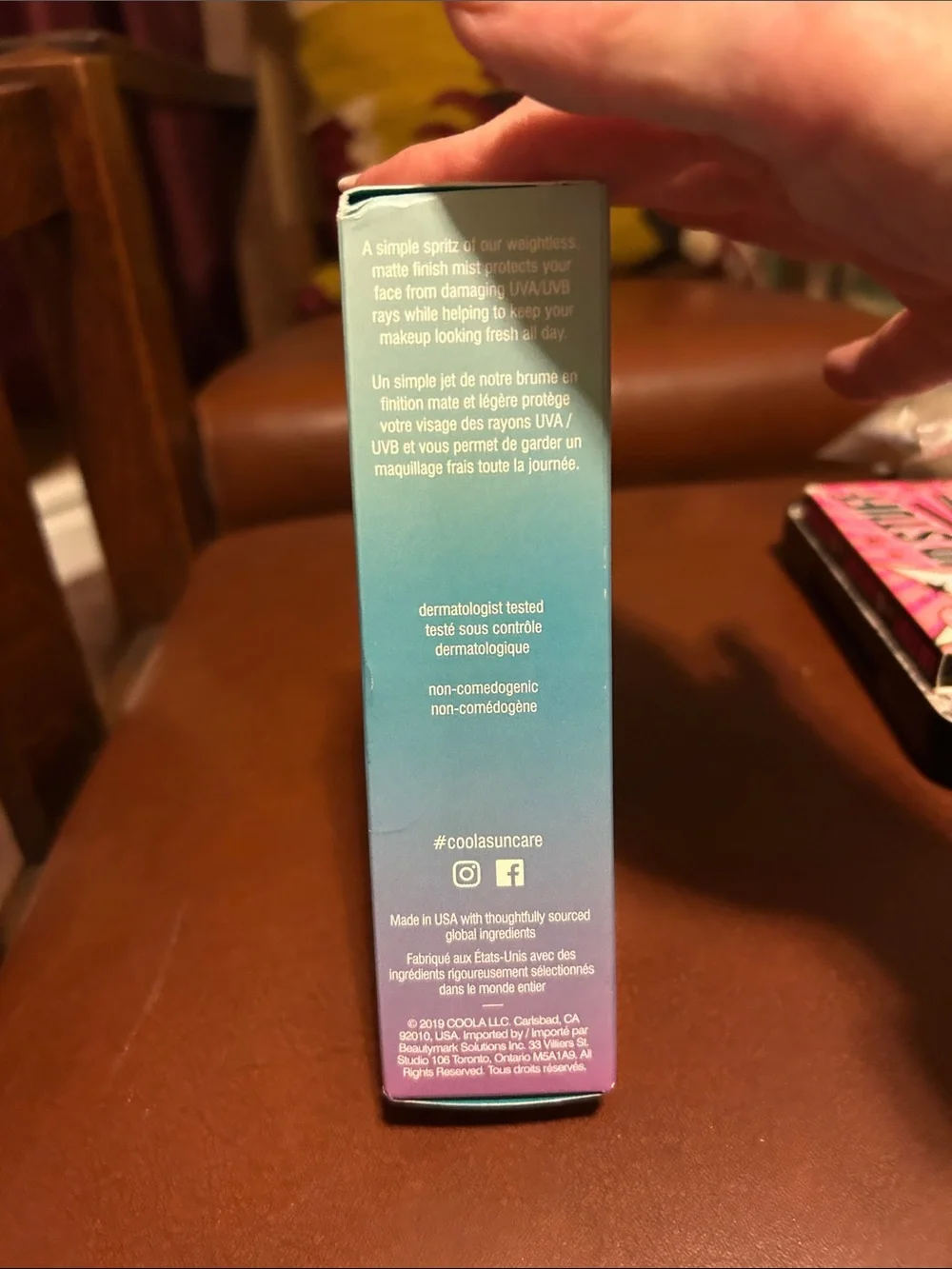 COOLA Makeup Setting Spray in Teal to Purple Gradient Box never opened .